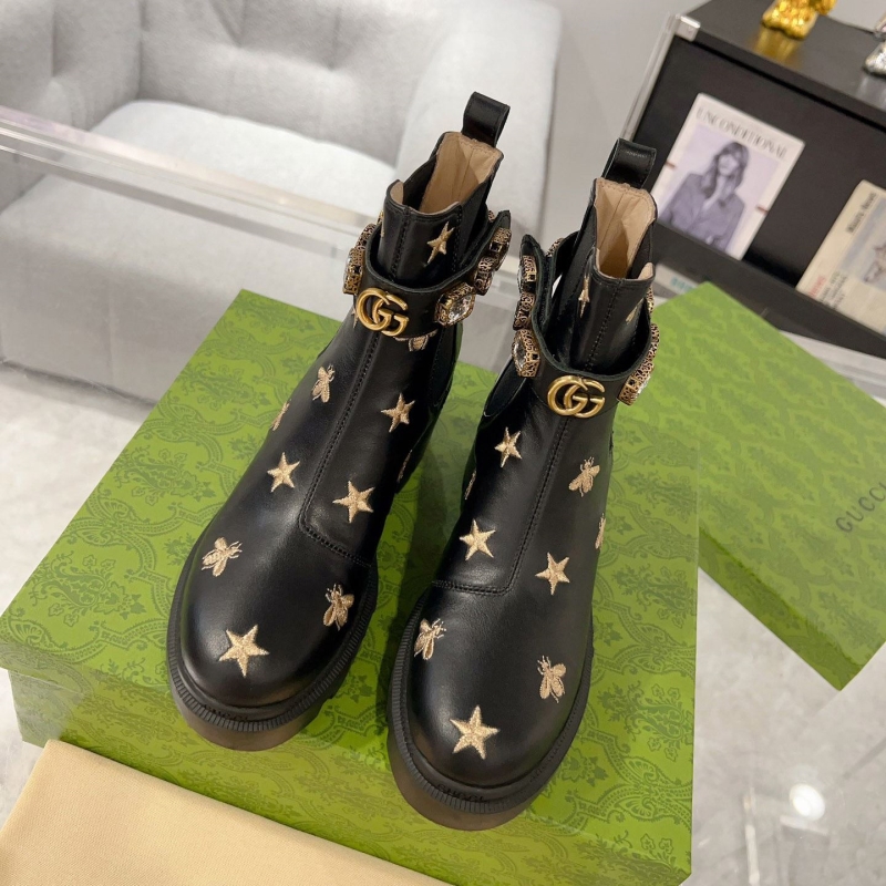 G*u*i boots